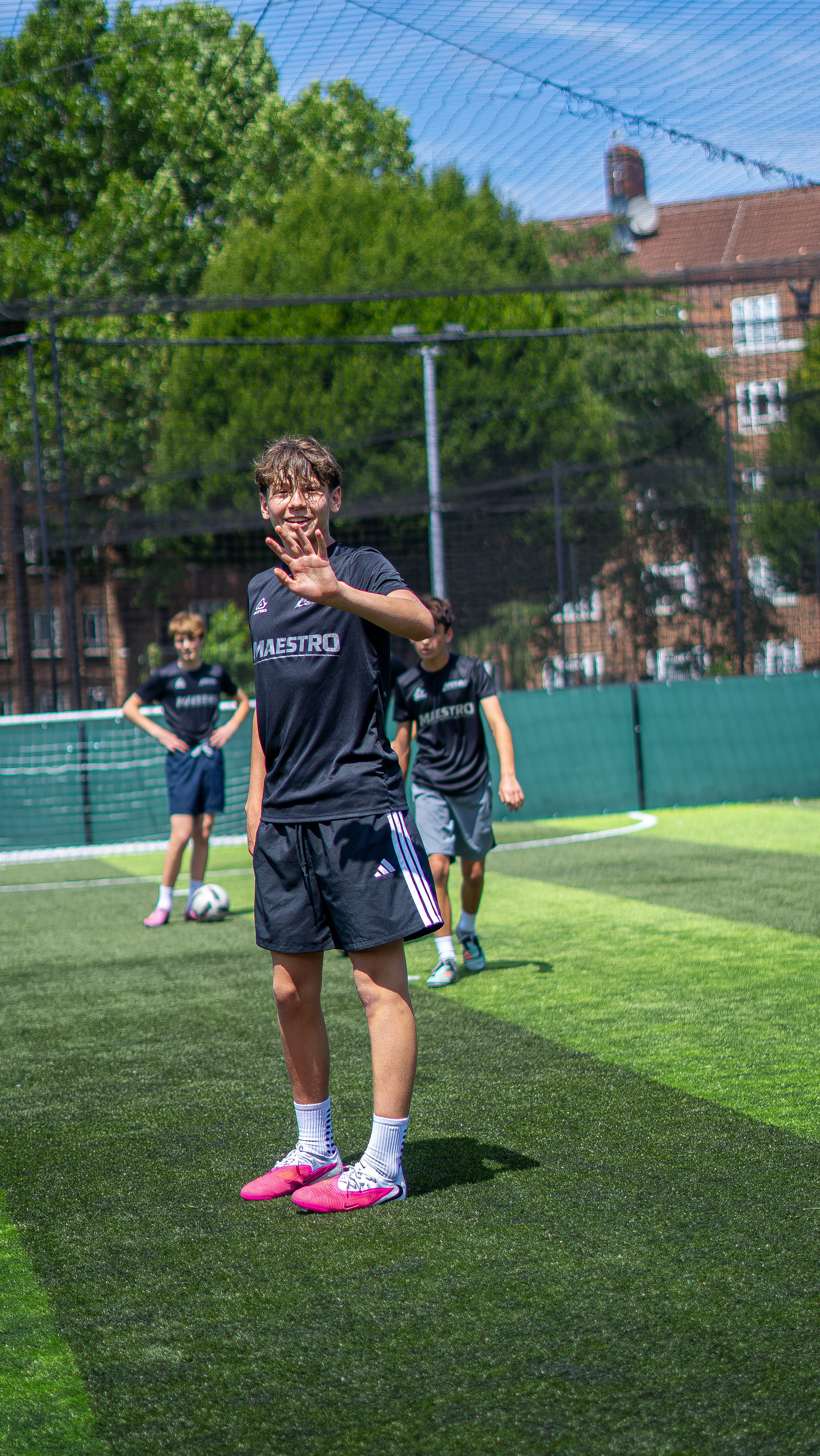 Maestro player smiling on the pitch